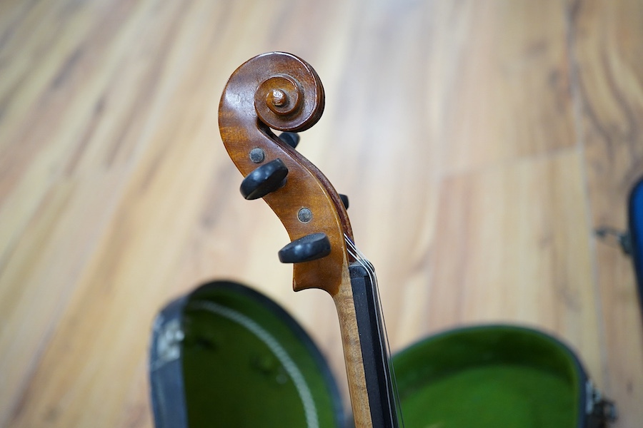 A quantity of violin parts and violins, a ukelele, a double bass scroll, a pinfold metronome, a violin case by Hill, a viola etc. Condition - for restoration